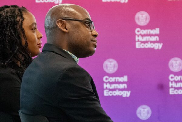 Tashara M. Leak (left), associate professor of nutrition in Cornell Human Ecology, and Neil Lewis, Jr. ’13 (right), associate professor of communication in the College of Agriculture and Life Sciences, listen during the 2023 ARC Symposium in New York City.